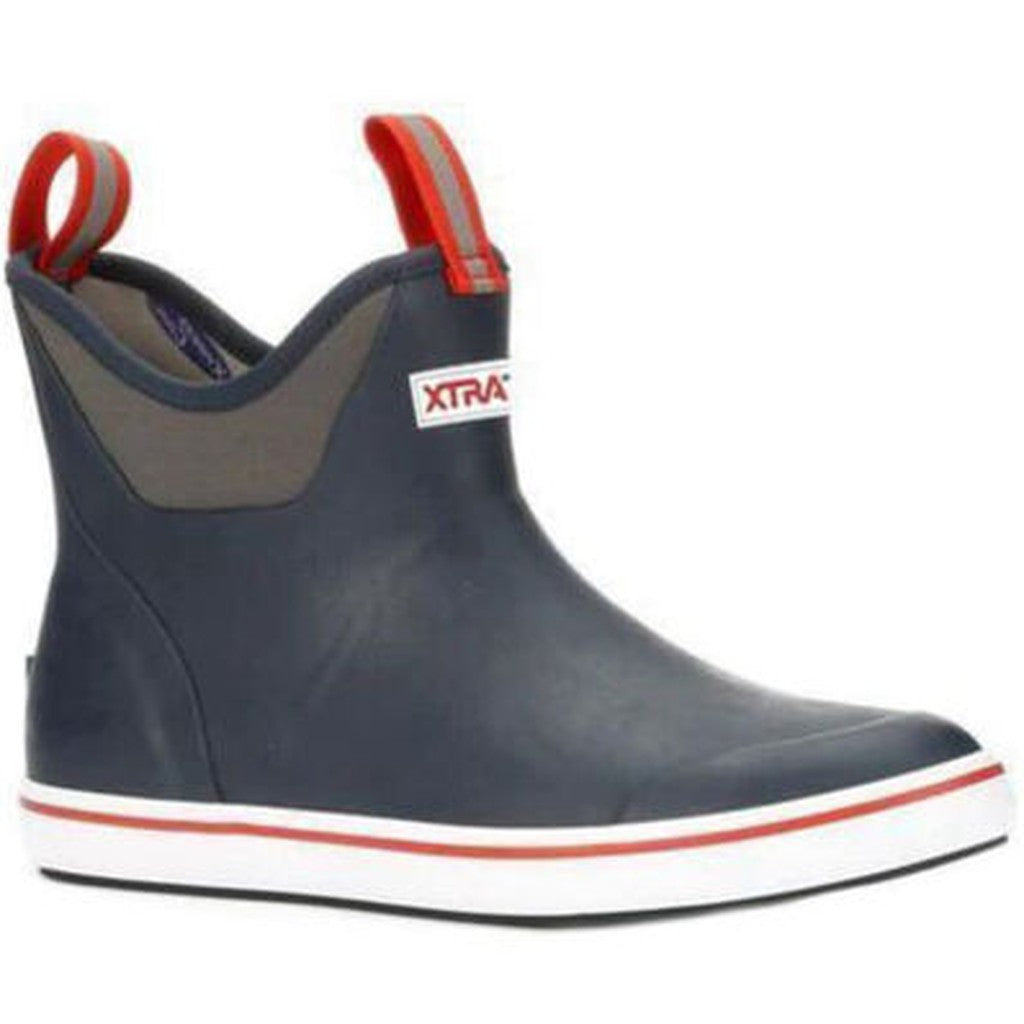 Navy blue waterproof rubber ankle boot with red pull loops and white sole, outdoor footwear
