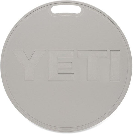 Round grey YETI cooler lid with integrated handle, outdoor accessory